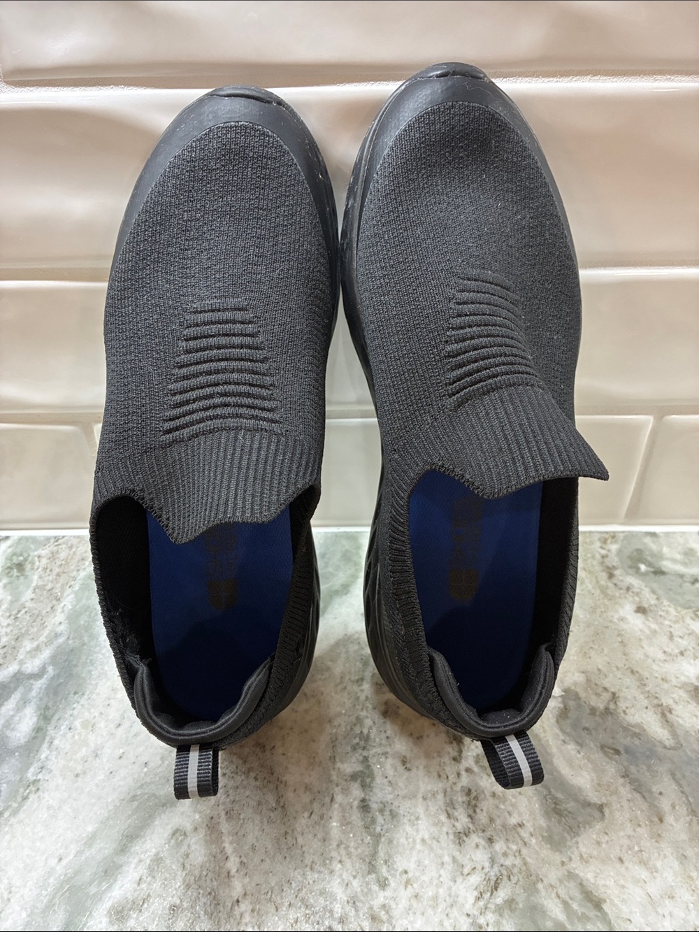Shoes For Crews Black Slip-On Knit Work Sneakers by Skechers.